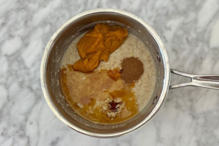 Pumpkin spice oatmeal in saucepan