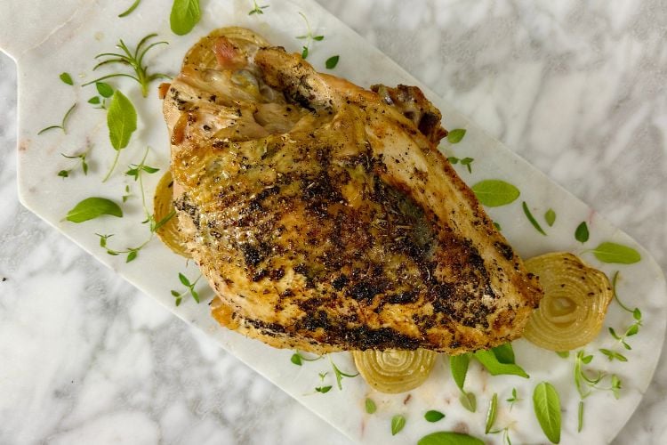 Roasted brined turkey breast in pan