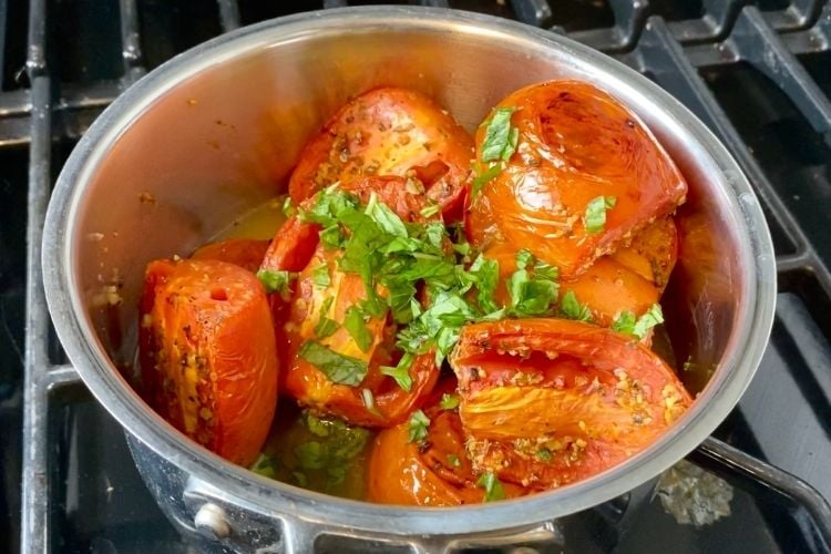 Roasted tomatoes in saucepan