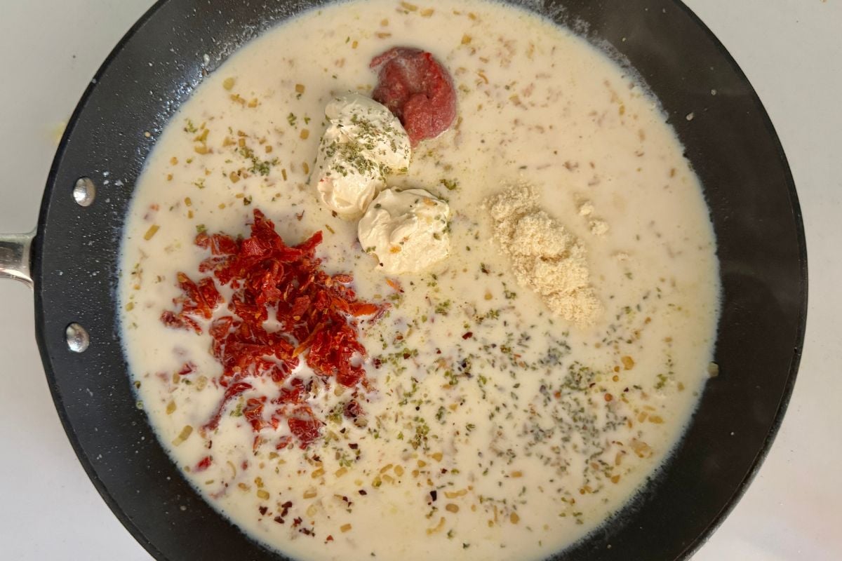 Sauce ingredients for Marry Me Chicken in skillet