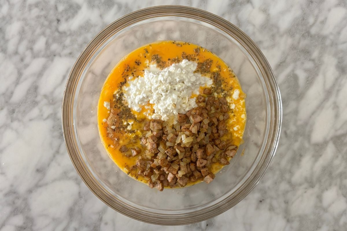 Sausage quiche ingredients in bowl