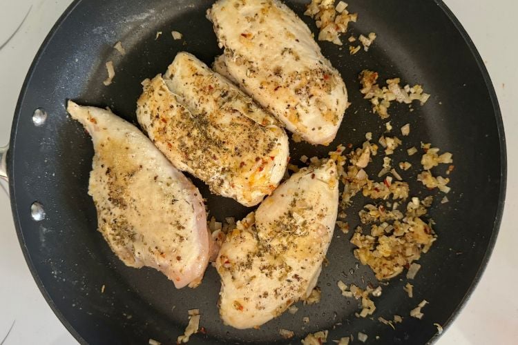 Seared chicken in a pan