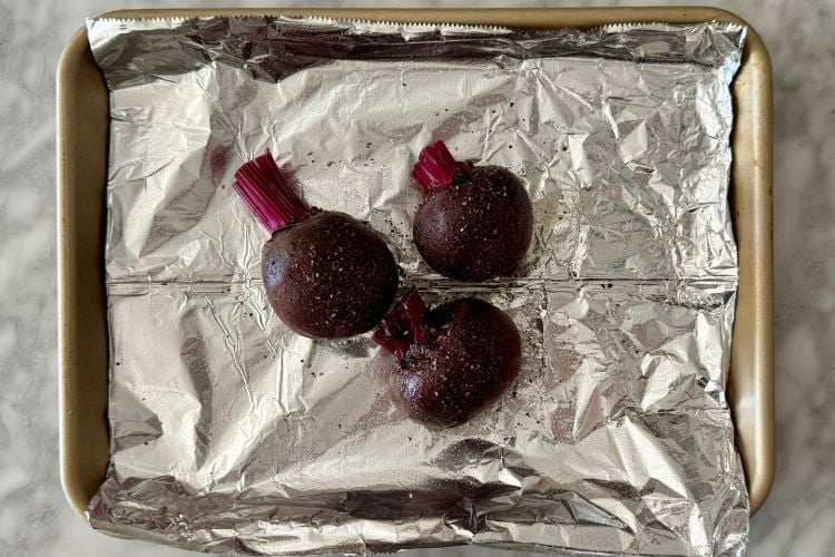 Seasoned beets on piece of foil