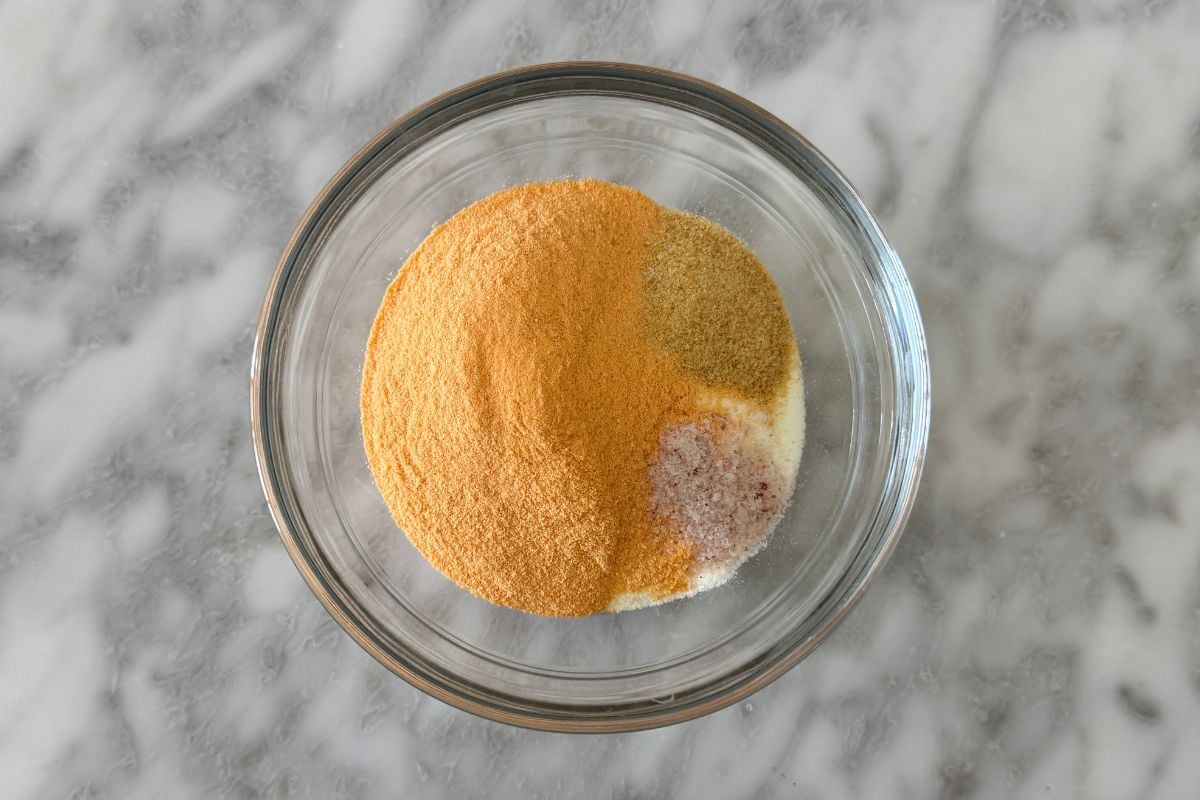 Seasoning mixture for cheddar protein popcorn