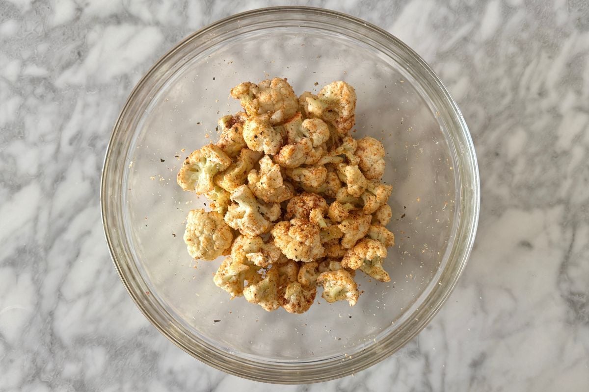 Seasonings in bowl with cauliflower