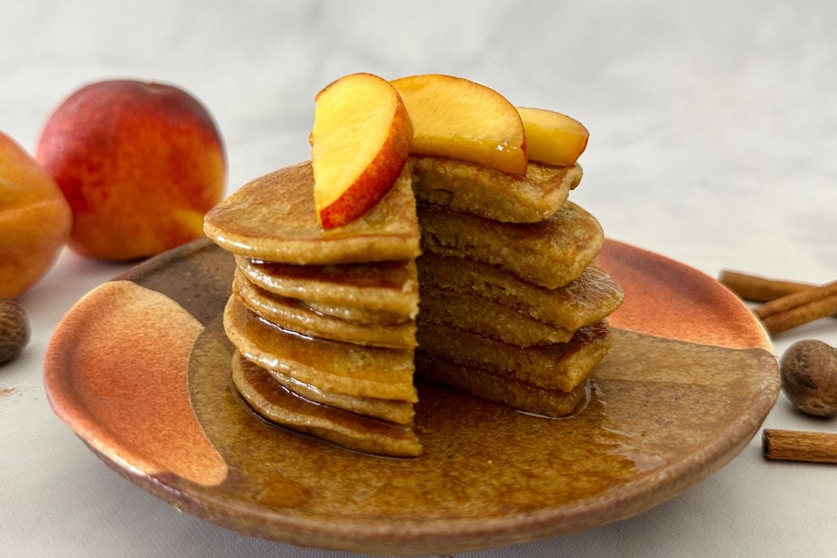 Serving peach pancakes on a plate
