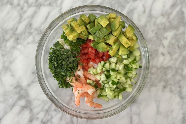 Shrimp salad ingredients in bowl
