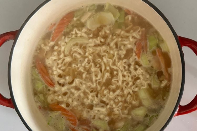 Simmering ramen noodles
