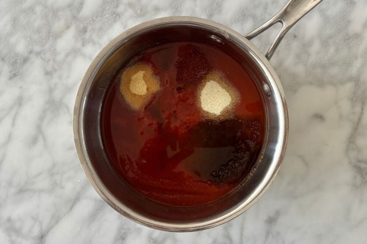 Smoky BBQ sauce ingredients in saucepan