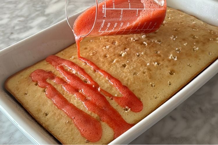 Strawberry juices poured over cake