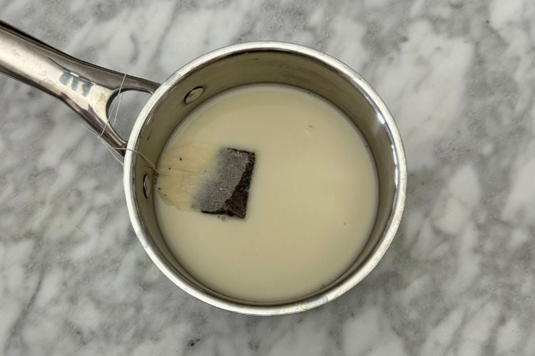 Tea bag steeping in almond milk