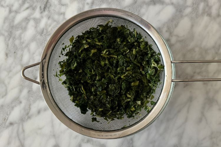 Thawed and drained frozen spinach