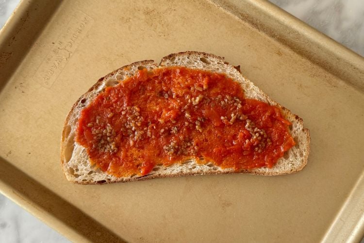 Toasted bread with pizza sauce
