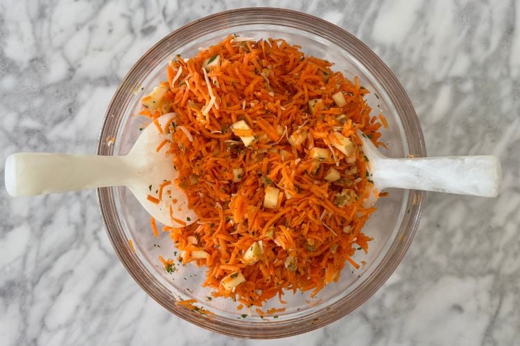 Tossed carrot salad in a bowl
