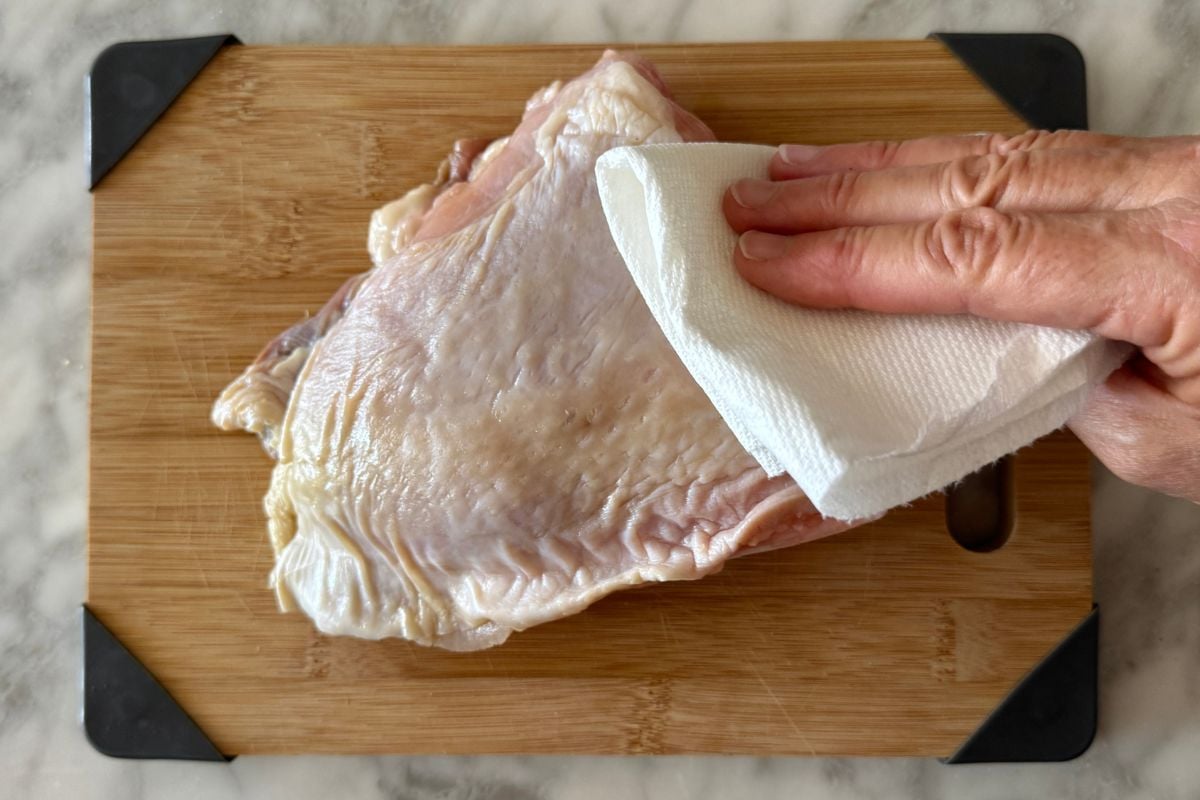 Turkey breast pat dry with paper towels