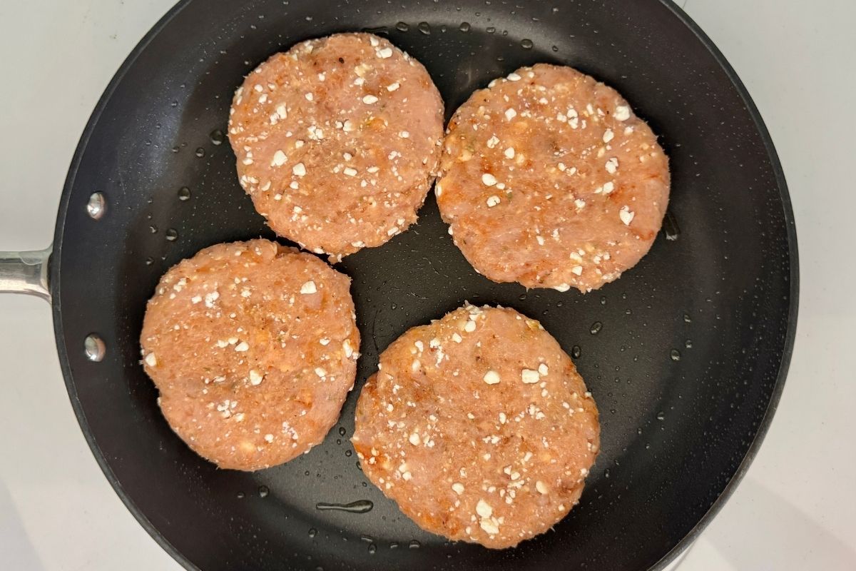 Turkey burger patties in pan