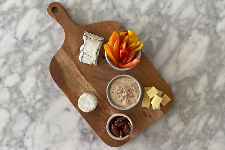 Vegetables and dips on the board