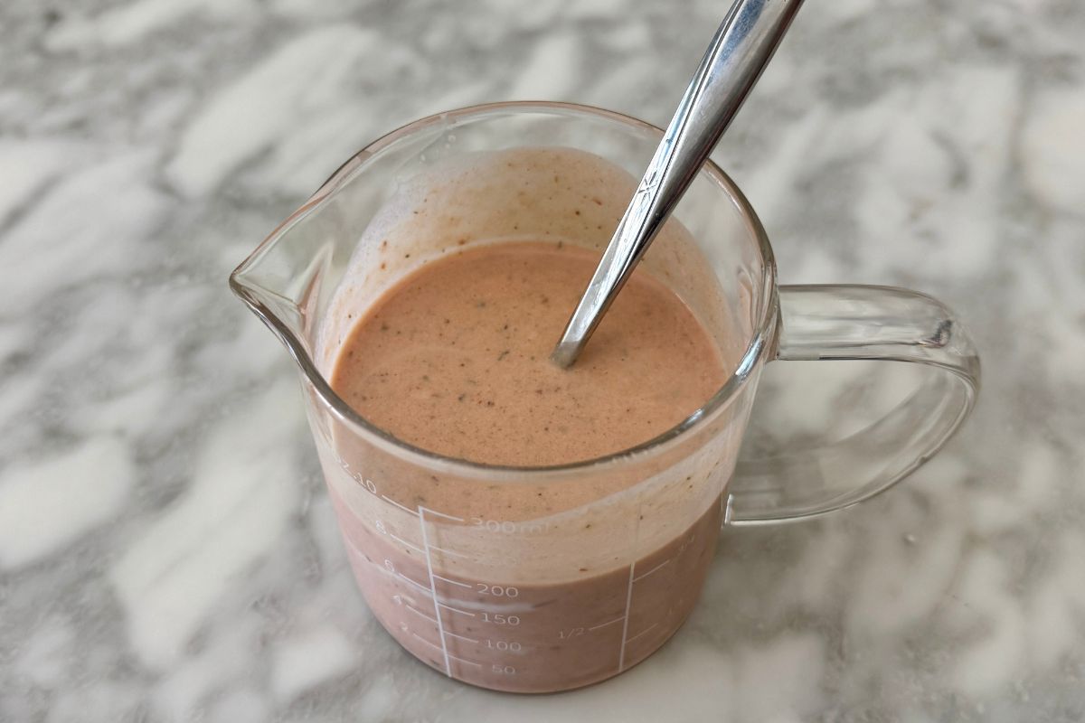 Whisked BBQ ranch dressing in bowl