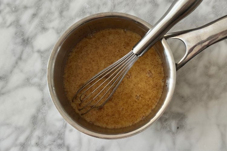Whisked ingredients for pumpkin chai latte