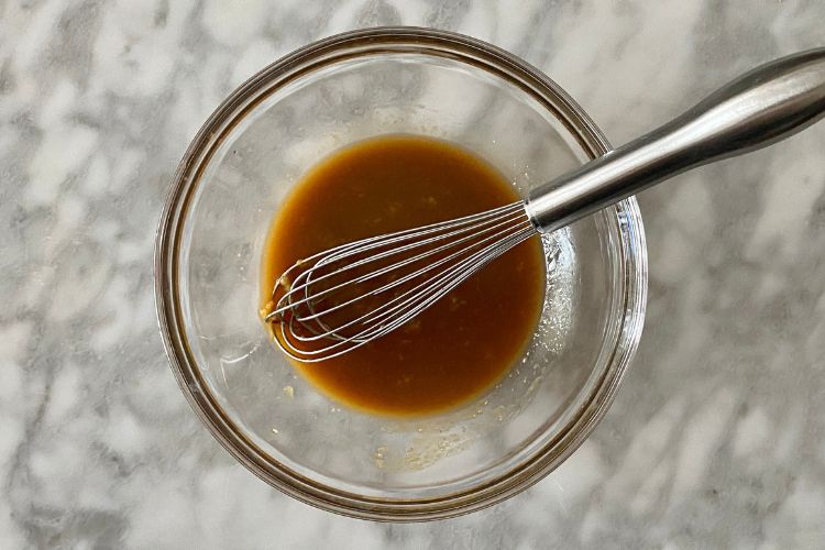 Whisked marinade in bowl