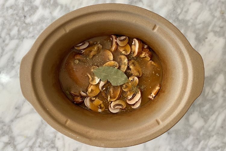 The chicken and gravy in slow cooker