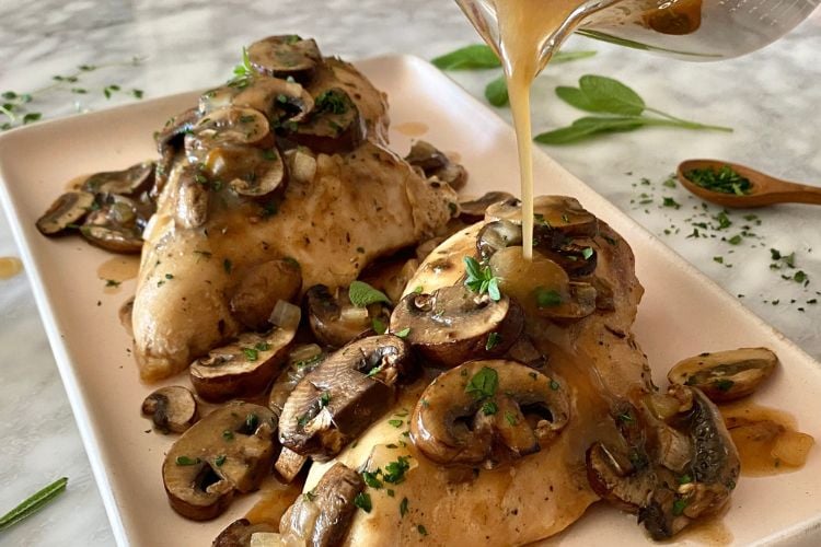 Chicken with gravy on plate