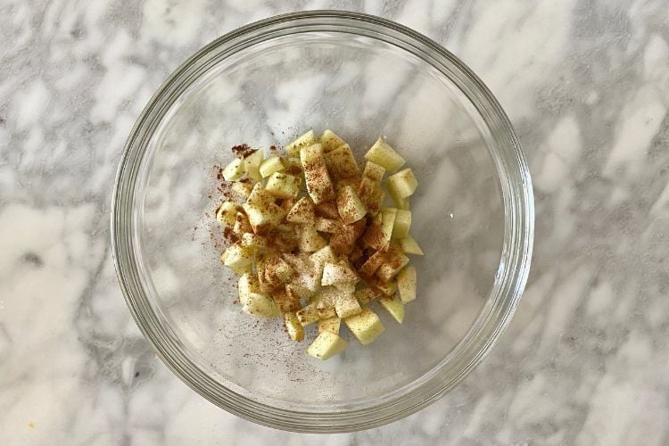 coated apples in a bowl