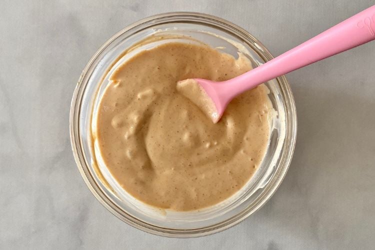 mixed queso dip in a bowl