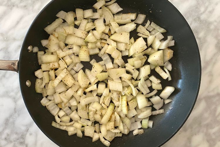 seasoned onions in a pan